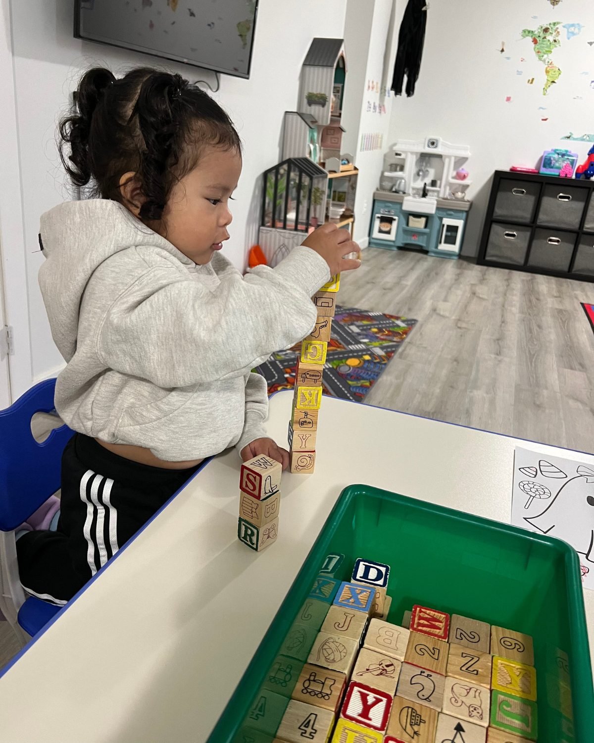 child plays with toys